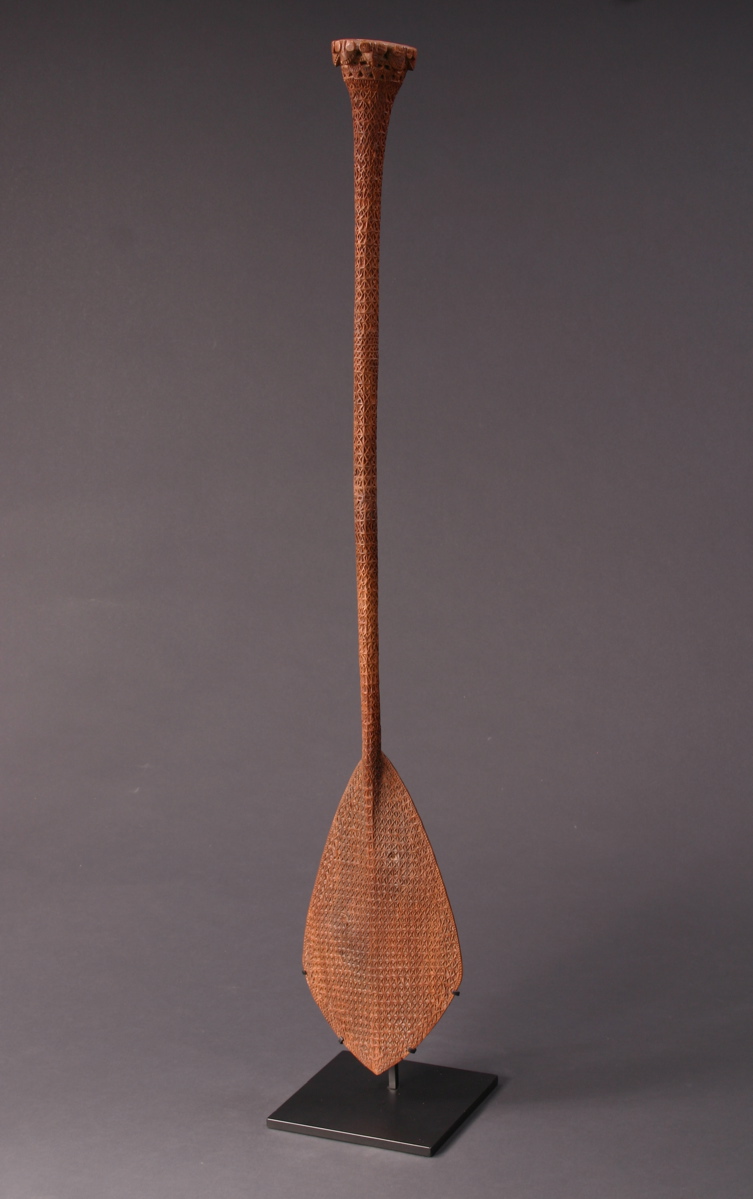 #OC222: 19th century Austral Island ceremonial paddle with intricate  
designs