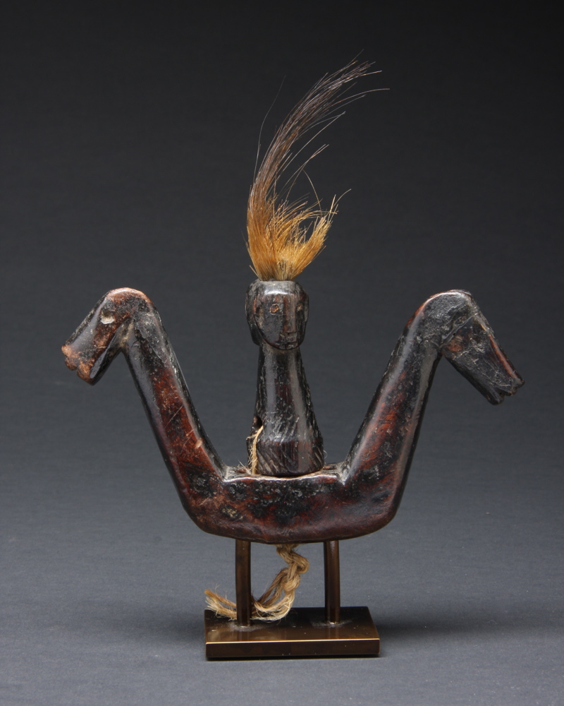 #PH210: Northern Philippine gong handle in the form of a double-sided figure and two horse heads